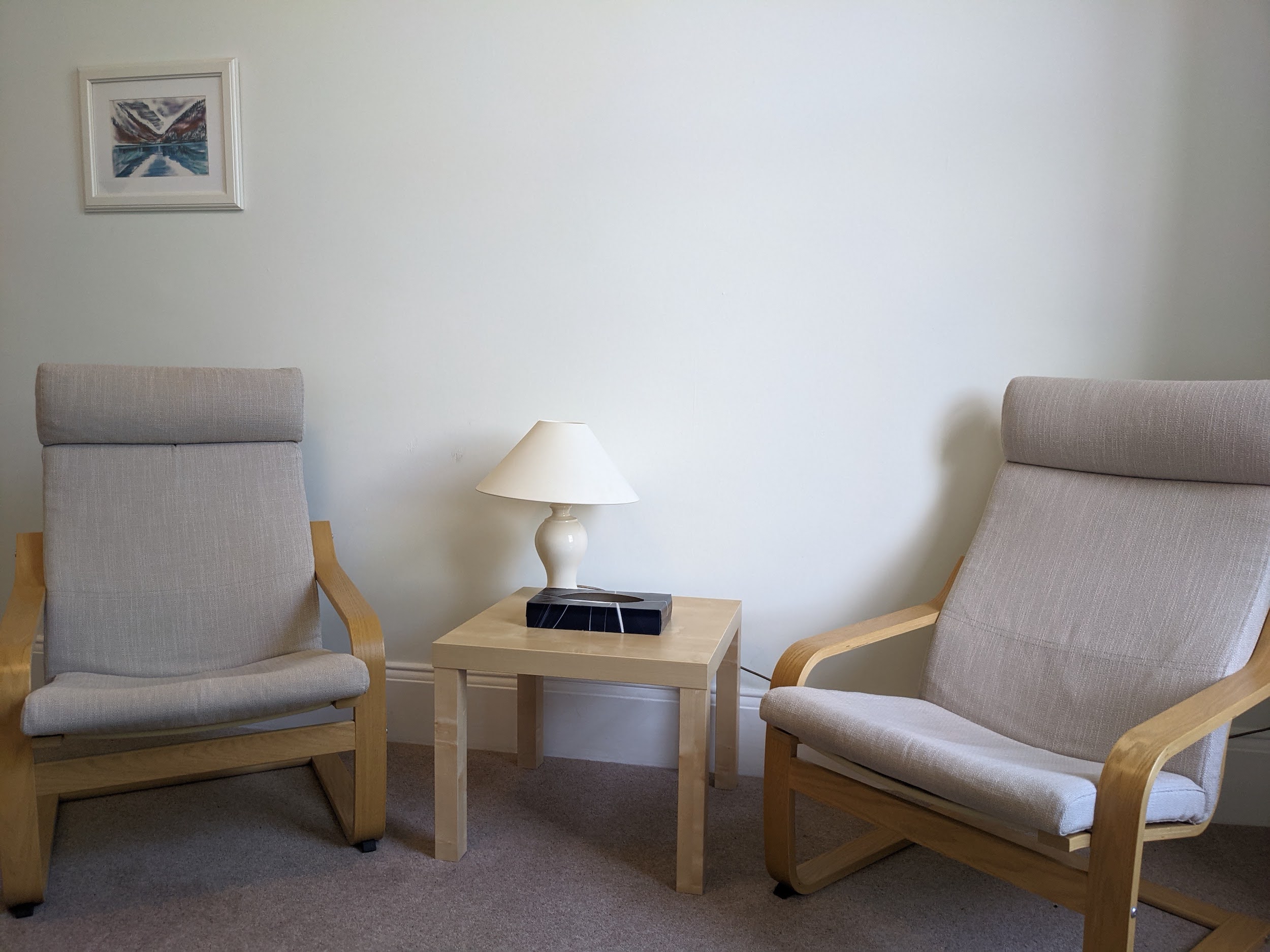 TherapyRoomC Two chairs and a table